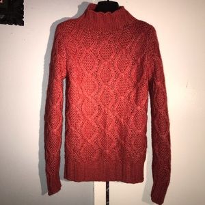Cable-knit mockneck sweater